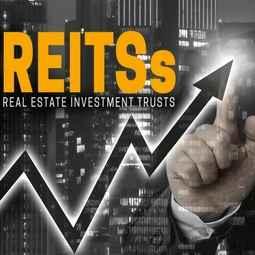 reits-concept-shown-by-businessman-260nw-1093578542.jpg